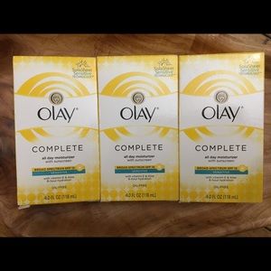 6 Olay Complete Moisturizer sensitive skin bottles